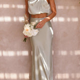 Conjunto de fiesta elegante con top drapeado y falda larga