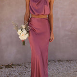 Conjunto de fiesta elegante con top drapeado y falda larga