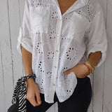 Blusa Azul con Bordado Calado y Bolsillos Frontales para Mujer