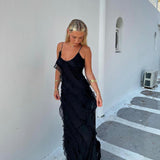 Vestido largo con volantes en capas y tirantes finos