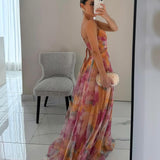 Vestido de gala largo con tirantes finos y estampado fluido – Elegancia para eventos