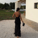 Vestido largo con volantes en capas y tirantes finos