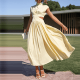 Vestido midi con cuello alto, pliegues y aberturas laterales