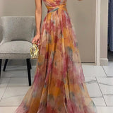 Vestido de gala largo con tirantes finos y estampado fluido – Elegancia para eventos