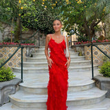 Vestido largo con volantes en capas y tirantes finos