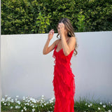 Vestido largo con volantes en capas y tirantes finos