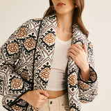 Chaqueta acolchada boho con estampado geométrico elegante