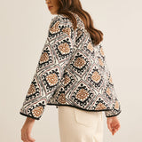 Chaqueta acolchada boho con estampado geométrico elegante
