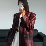 Oversized Faux Leather Blazer with Sharp Tailoring and Street-Chic Edge