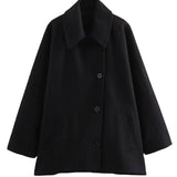 Abrigo oversize elegante con diseño midi y estilo moderno