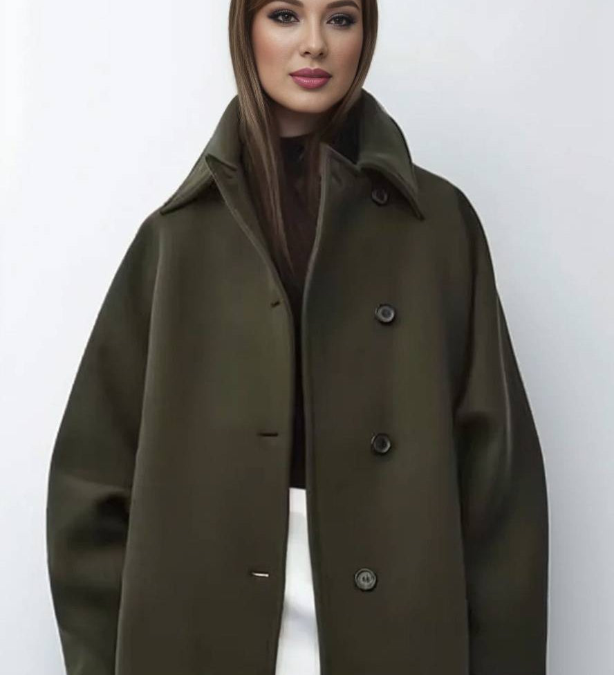 Abrigo oversize elegante con diseño midi y estilo moderno