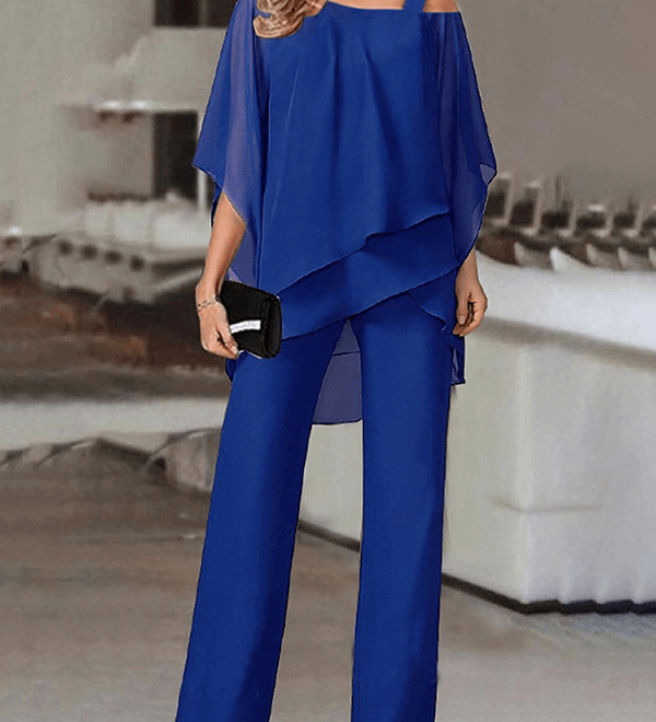 Conjunto elegante de fiesta con top asimétrico y pantalón fluido