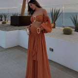 Conjunto elegante de top palabra de honor con maxi falda fluida