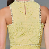 Conjunto veraniego de dos piezas con top bordado y falda maxi