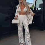 Conjunto de playa calado con kimono, top y pantalón acampanado
