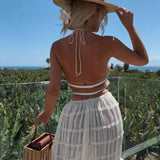 Conjunto de verano con top halter y falda larga plisada