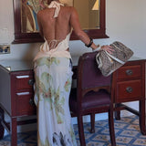 Conjunto de verano con top drapeado y falda larga estampada