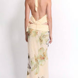 Conjunto de verano con top drapeado y falda larga estampada
