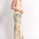 Conjunto de verano con top drapeado y falda larga estampada