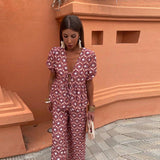 Conjunto elegante de top estampado y pantalón fluido