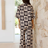 Conjunto de dos piezas con estampado de conchas marinas y estilo veraniego