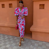Vestido midi con estampado abstracto y mangas abullonadas