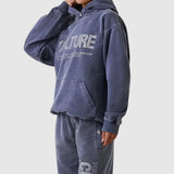 Vintage-Washed Oversized Hoodie with CULTURE Graphic