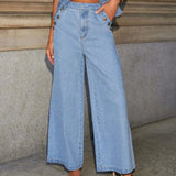 Conjunto denim de dos piezas con chaleco abotonado y pantalón de pierna ancha