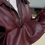 Chaqueta corta oversize efecto piel en burdeos
