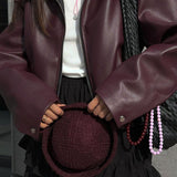 Chaqueta corta oversize efecto piel en burdeos
