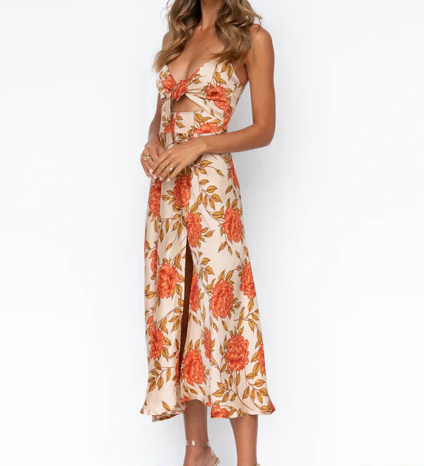 Vestido midi floral con escote anudado y tirantes finos