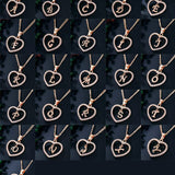 Collar inicial corazón oro rosa – acero inoxidable