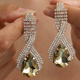 Pendientes largos con cristales en forma de lágrima – joyas de noche